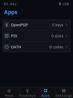 The trusted display’s Apps tab listing three applets as read-only rows: OpenPGP (0 keys), PIV (0 slots) and OATH (0 codes), each with a chevron to drill in