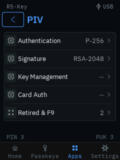 The trusted display’s PIV overview: Authentication (P-256), Signature (RSA-2048), empty Key Management and Card Auth slots, a “Retired & F9” row showing 2 populated slots, and the PIN / PUK attempt counts